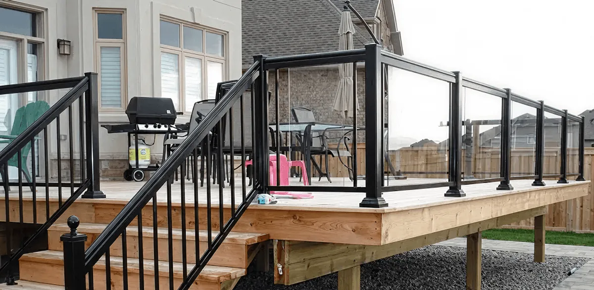 Handrail installation on a deck staircase for safety and code compliance in San Diego, CA